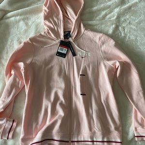 Light pink nike zip up